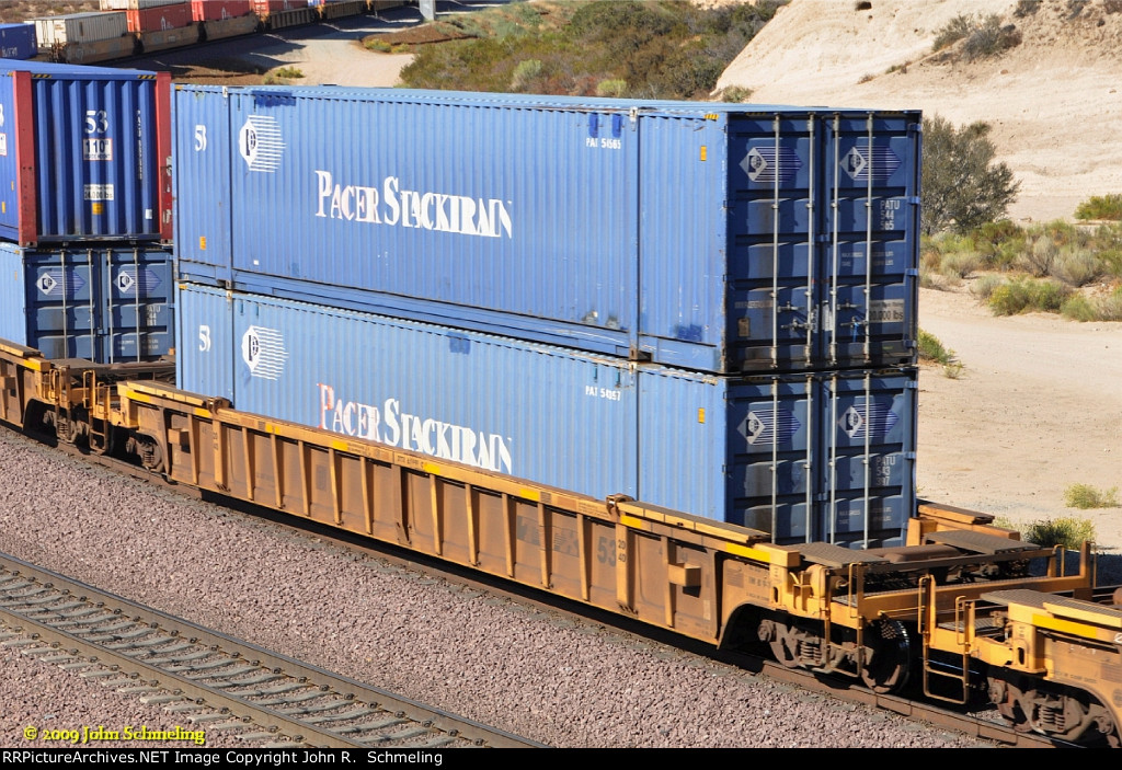 DTTX 620999-C at Alray-Cajon Pass CA with Pacer Stack Train containers.  9/22/2009